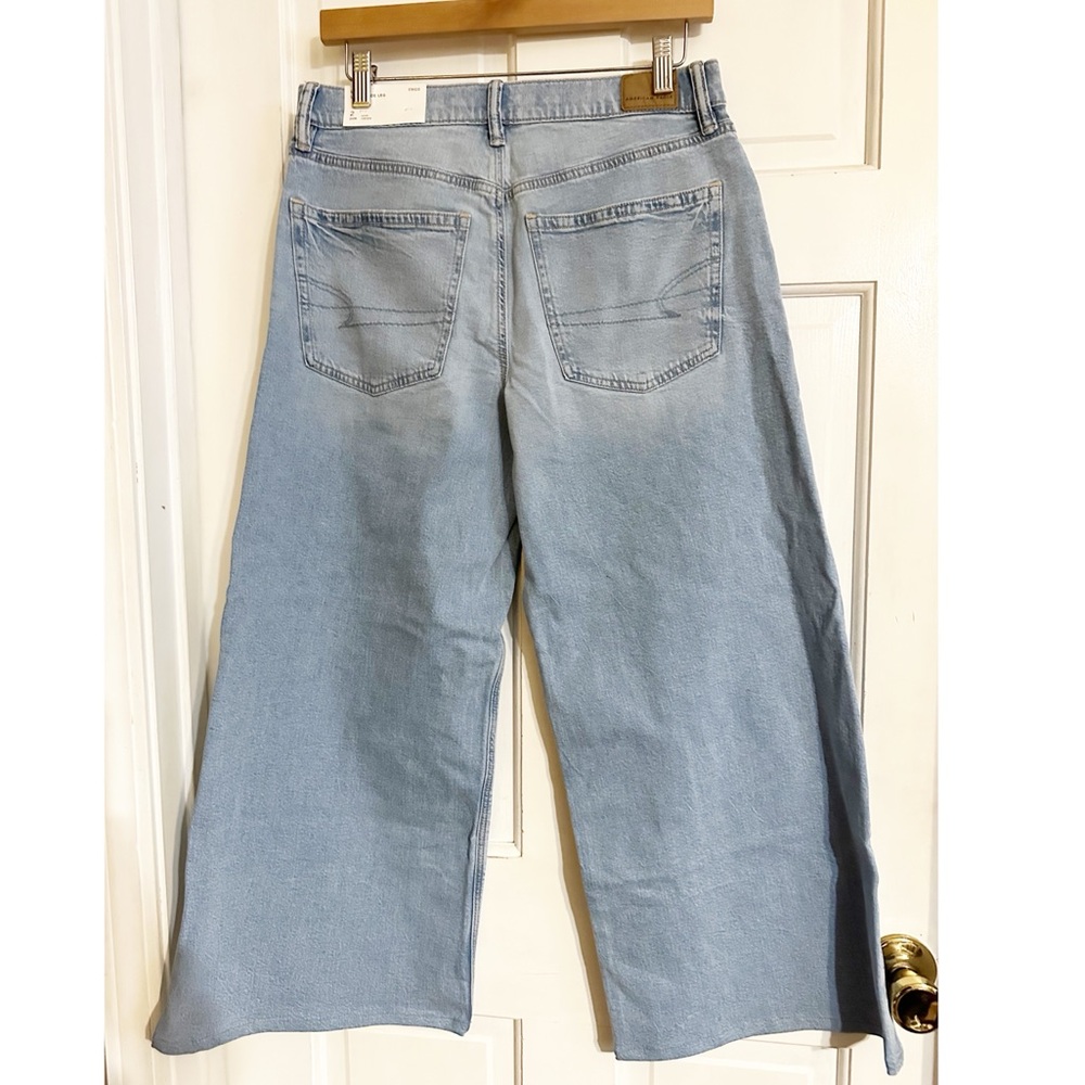 American Eagle Low Rise Ultra Wide Leg Light Aglow Strigid Jeans Jeans NWT Sz 2 - Picture 6 of 9